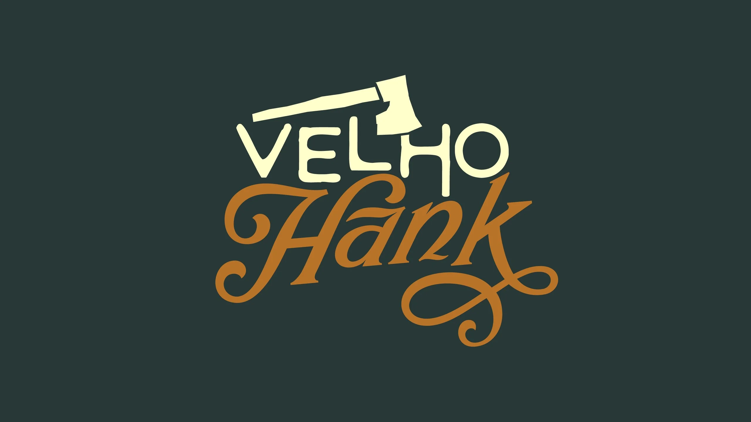 Velho Hank logo: VELHO in cream capitals with an axe, Hank in caramel script, on forest green