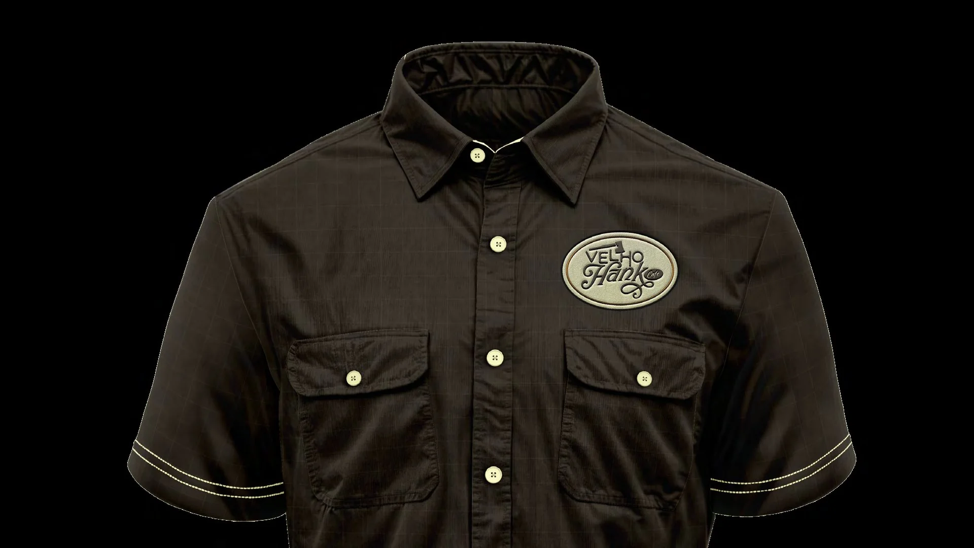 Dark work shirt with the Velho Hank patch