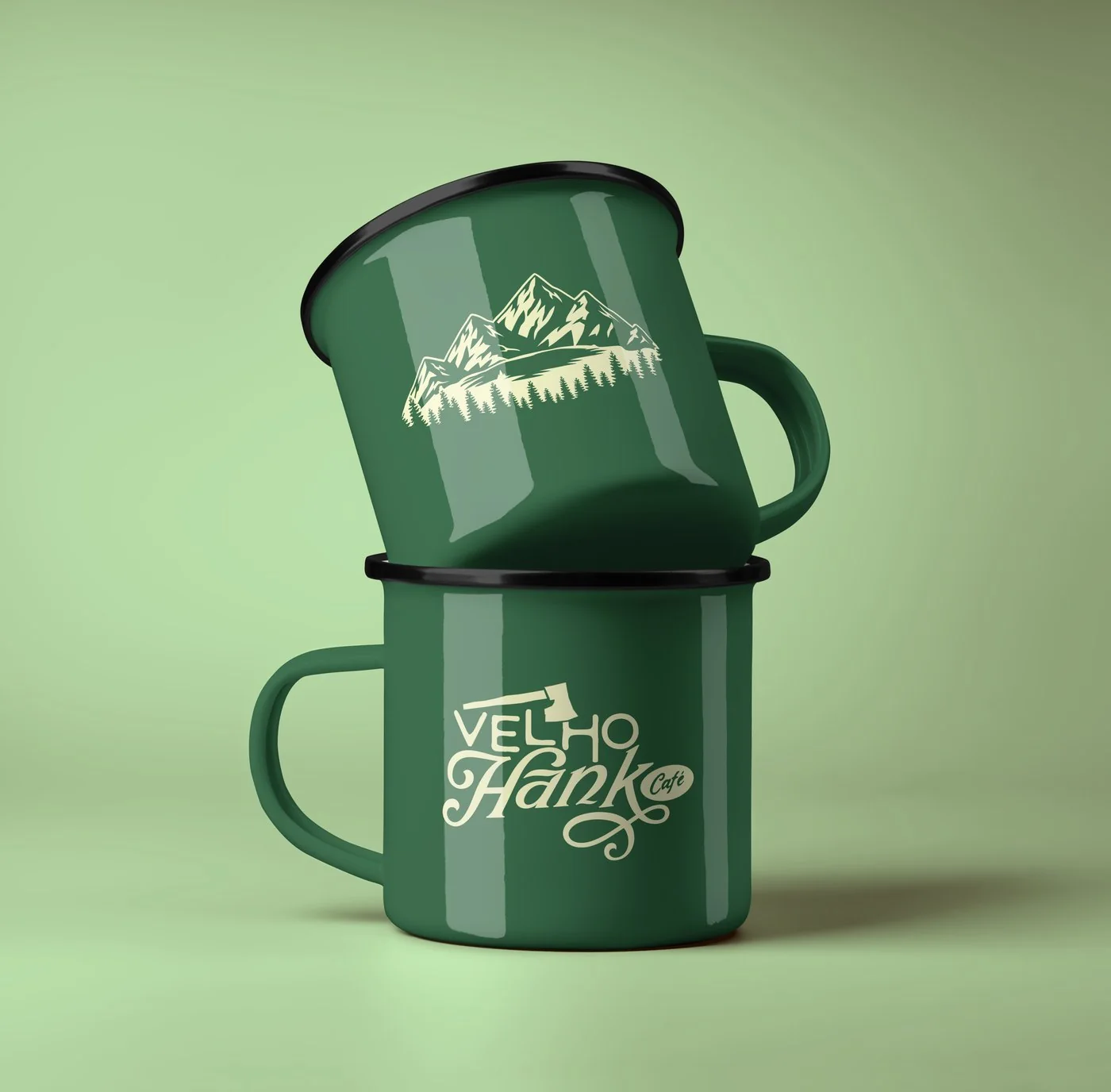Green enamel mugs with the mountains and the Velho Hank logo