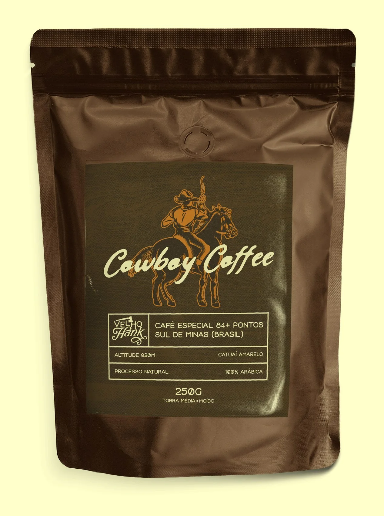 Alternative Cowboy Coffee bag with a dark label and a cowboy on horseback