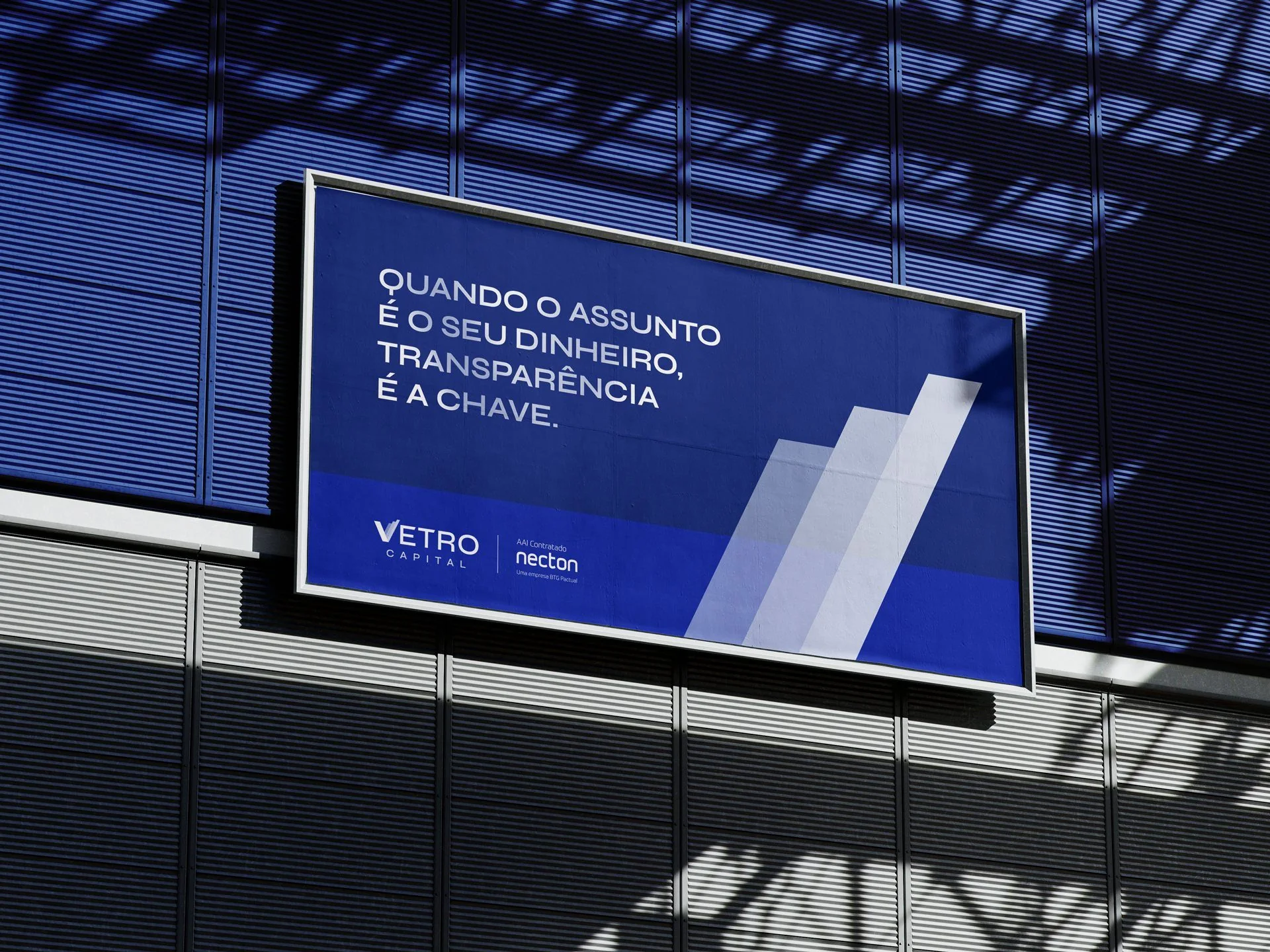 Vetro Capital billboard on a blue building wall